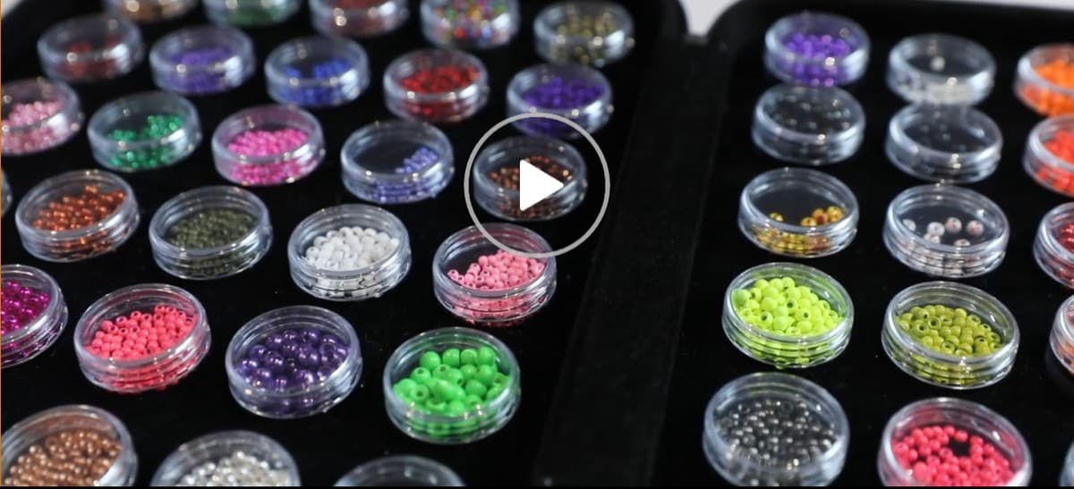 A. Winston Fly Binder open showing fly organization system